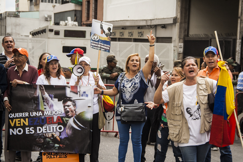 Protesters supporting López assemble outside the Palace of Justice every time the leader is brought to a hearing