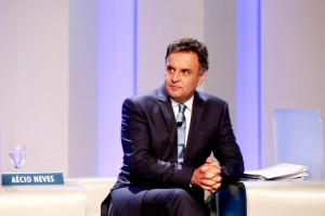 With a surprise second-place finish, Aécio Neves will face Rousseff in a runoff later this month.