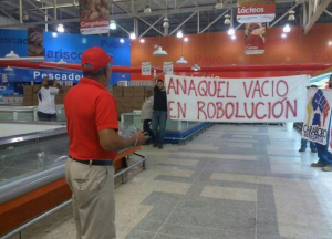 Protesters inside a state-run supermarket in Valencia, Venezuela.