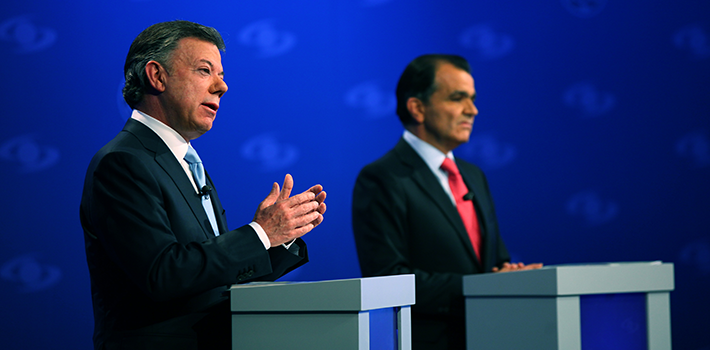 Juan Manuel Santos and Óscar Iván Zuluaga during a debate on Caracol TV