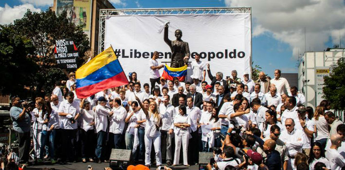 In the square where Leopoldo López surrendered to authorities a year ago, the Venezuelan opposition protesters demanded justice for the political leader.