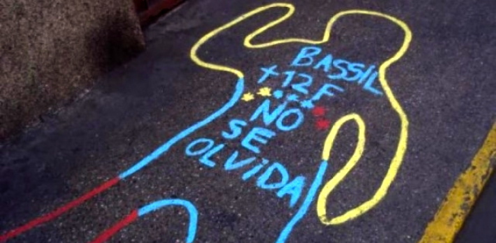 On the ground where Bassil Dacosta fell, a sign written by neighborhood residents reads: "Bassil 12-F, We won't forget."