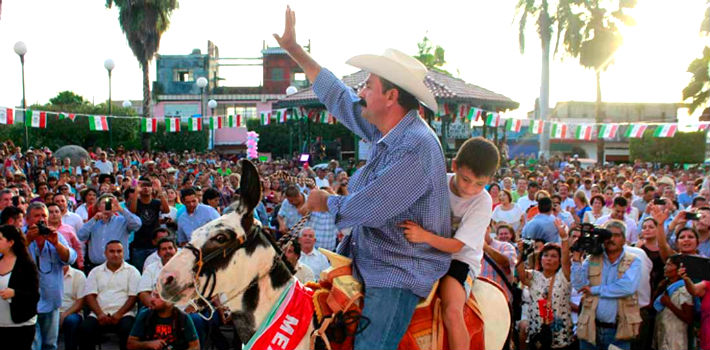 The mayor became famous across Mexico last year when he arrived at a public event riding a horse and throwing bills to the audience.