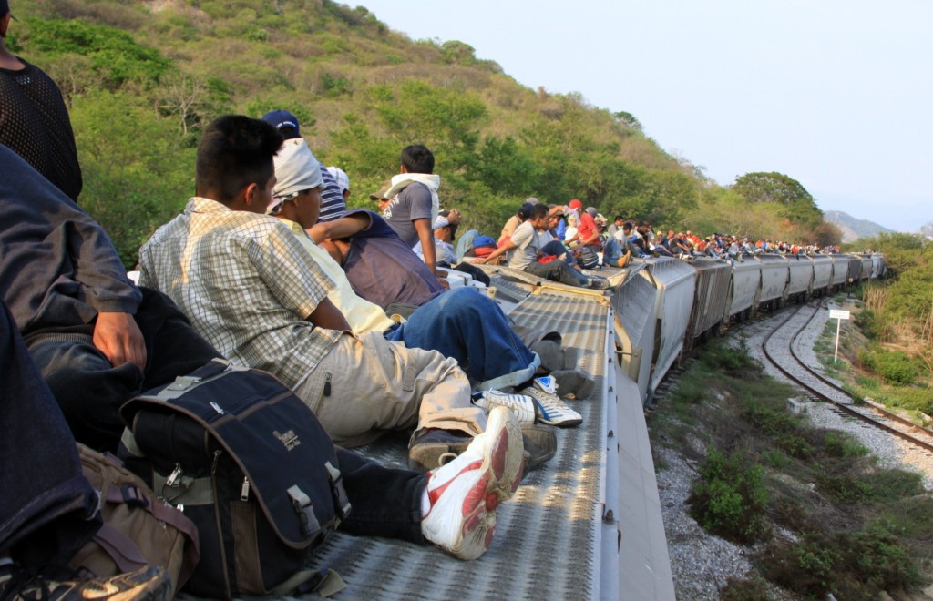 Immigrants traveling atop the train known as La Bestia