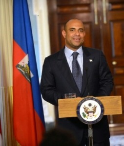 Lamothe had been under strong pressure to step down since protests in Haiti began.