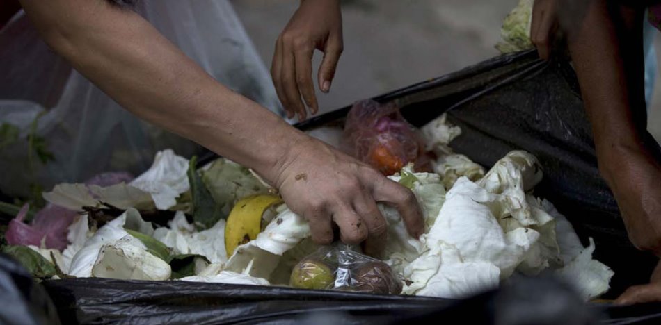 Soldiers Are Eating from the Garbage